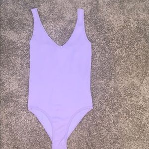 lavender one piece bodysuit